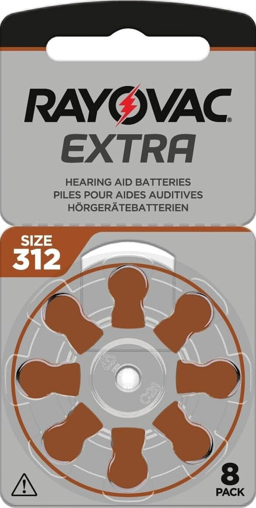 Packaging of Rayovac Extra hearing aid batteries, Size 312, 6-pack. The front of the package is gray with brown accents, featuring the Rayovac Extra logo with a red and black lightning bolt. A wheel of six batteries, marked with brown tabs, is visible through a transparent section.