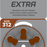 Packaging of Rayovac Extra hearing aid batteries, Size 312, 6-pack. The front of the package is gray with brown accents, featuring the Rayovac Extra logo with a red and black lightning bolt. A wheel of six batteries, marked with brown tabs, is visible through a transparent section.