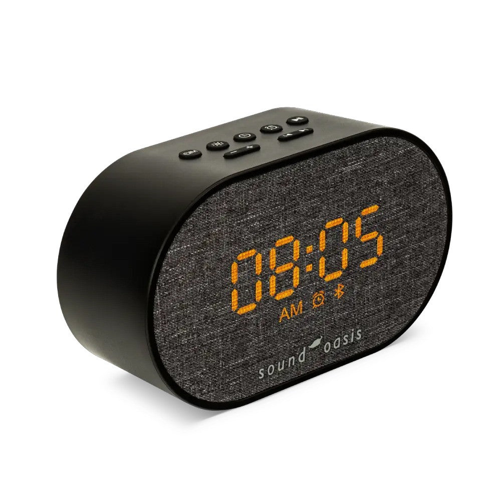Black digital clock with text 'sound oasis' on a white background