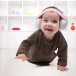 Alpine Muffy Baby pink being worn by a 1 year old crawling